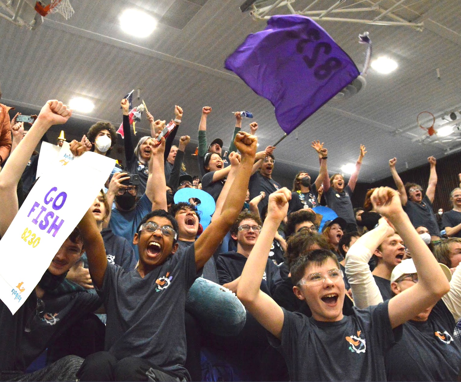 Students cheering at a Robotics competition.